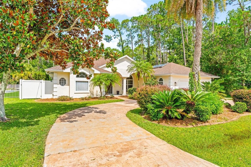 Welcome to 68 Egret Trail - A Golf Course Pool Home in the Heart - Beach Home for sale in Palm Coast, Florida on Beachhouse.com
