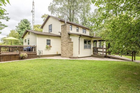 Small Town Country Living on 13.8 stunning Acres! This beautiful - Beach Home for sale in Applegate, Michigan on Beachhouse.com