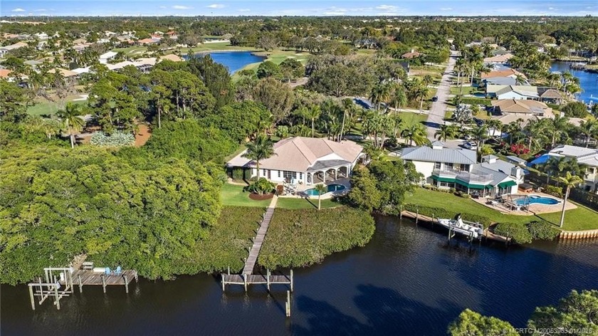 Discover this spectacular Howard Creek waterfront home! Ideally - Beach Home for sale in Stuart, Florida on Beachhouse.com