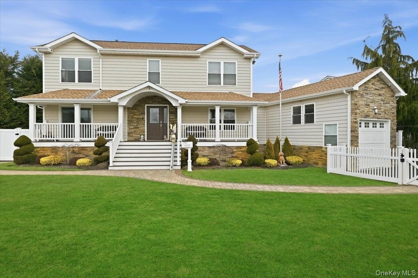 Welcome to Nassau Shores, where waterfront living meets timeless - Beach Home for sale in Massapequa, New York on Beachhouse.com