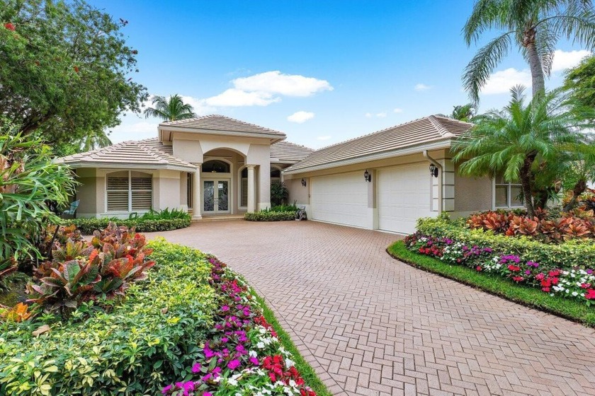 Nestled in the prestigious BallenIsles Country Club, this - Beach Home for sale in Palm Beach Gardens, Florida on Beachhouse.com