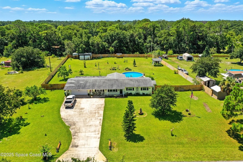 Peaceful Country Living with Modern Comforts - 1.12 Acres in - Beach Home for sale in Mims, Florida on Beachhouse.com