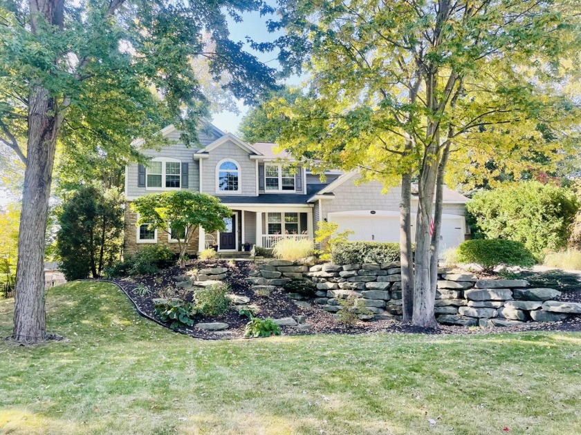 This stunning 5-bedroom, 3 1/2-bath home is nestled in the - Beach Home for sale in Spring Lake, Michigan on Beachhouse.com