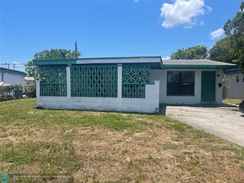 Get ready to fall in love! This home is situated on a large lot - Beach Home for sale in Pompano Beach, Florida on Beachhouse.com