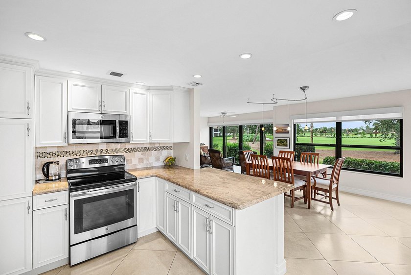 Exceptional golf course views wrap around this renovated - Beach Condo for sale in Boynton Beach, Florida on Beachhouse.com