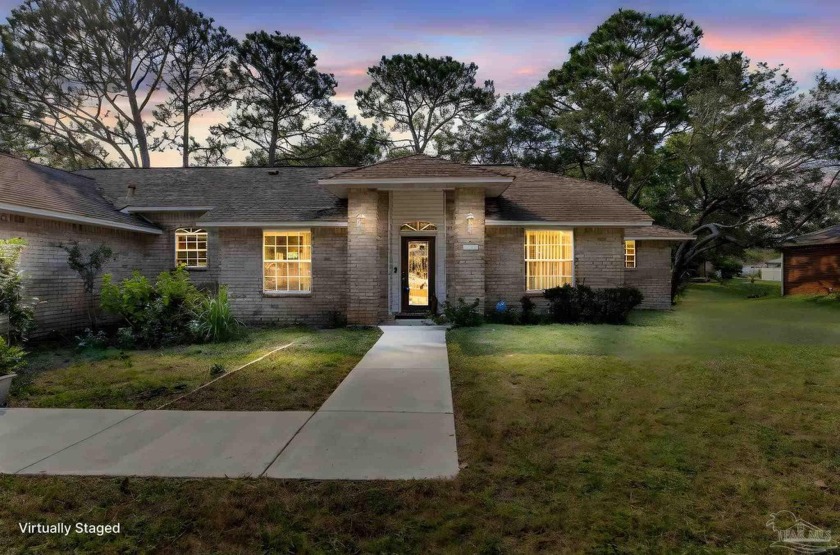 Welcome to this stunning brick home that blends classic style - Beach Home for sale in Pensacola, Florida on Beachhouse.com