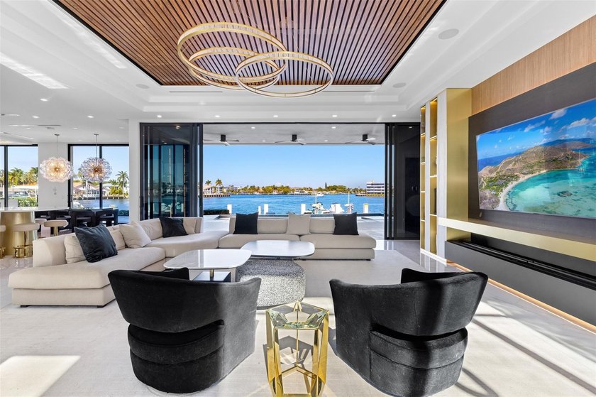 Positioned along 90 feet of prime Intracoastal frontage, this - Beach Home for sale in Lauderdale BY The Sea, Florida on Beachhouse.com