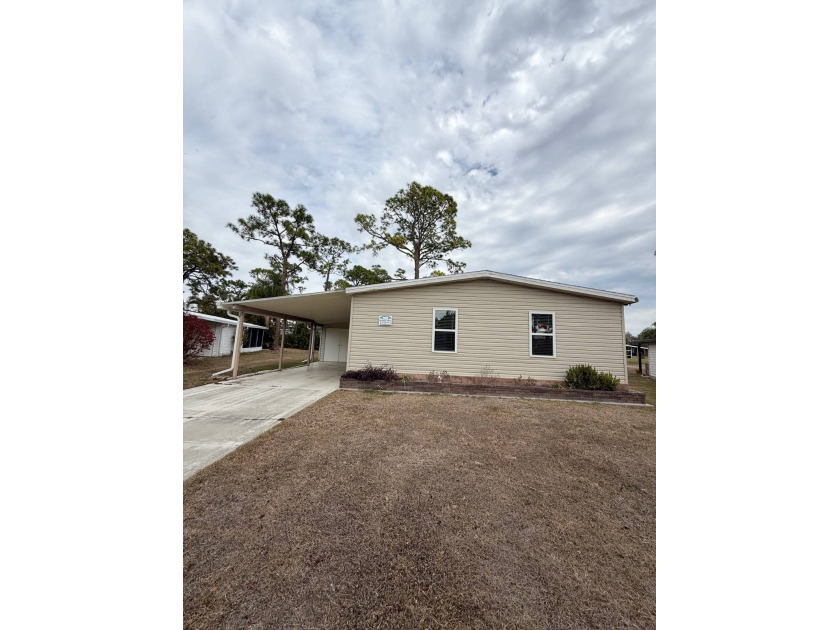 Stunning two-bedroom, two-bath home completely remodeled down to - Beach Home for sale in North Fort Myers, Florida on Beachhouse.com