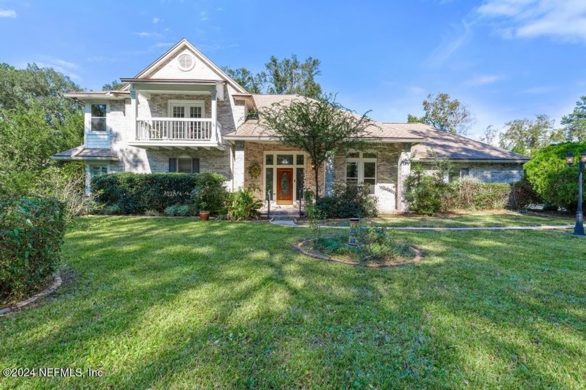 Welcome to this charming, custom built, brick home nestled in - Beach Home for sale in Fleming Island, Florida on Beachhouse.com