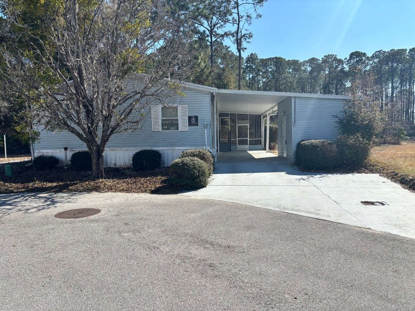 Welcome home to a rare find in the age-qualified land-lease - Beach Home for sale in St Augustine, Florida on Beachhouse.com