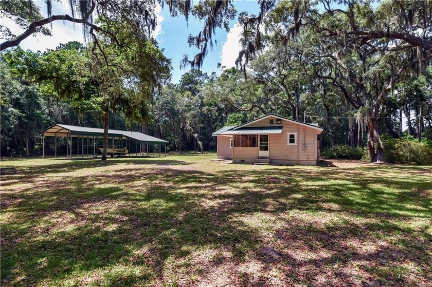 Nestled in the heart of Shellman Bluff, this two bedroom/two - Beach Home for sale in Townsend, Georgia on Beachhouse.com