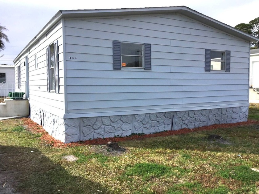 Discover carefree living in a coastal neighborhood! This - Beach Home for sale in Cocoa, Florida on Beachhouse.com