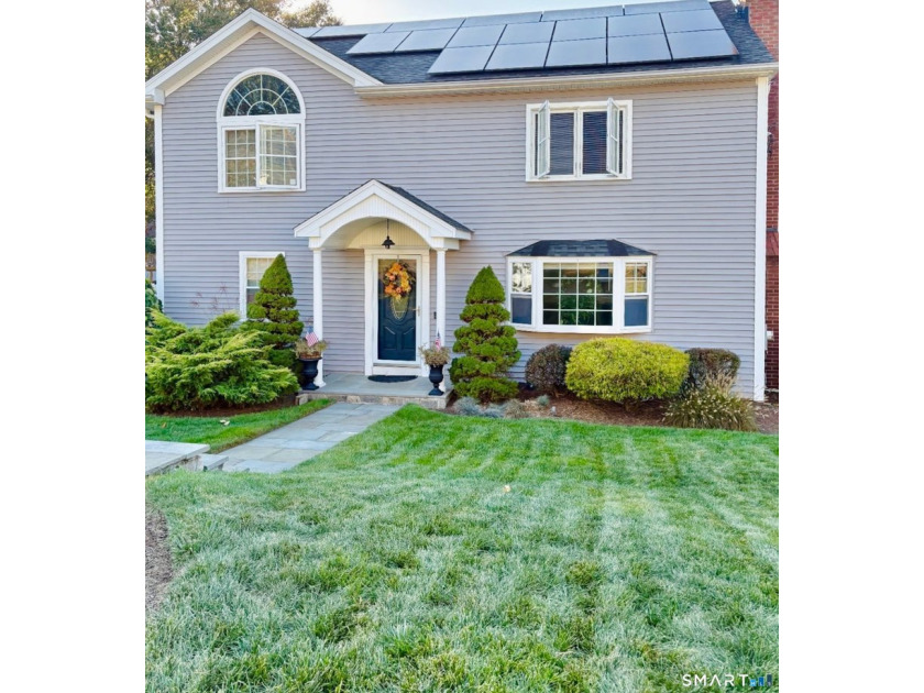 Welcome to this beautifully maintained 4-bedroom, 2 full - Beach Home for sale in Bridgeport, Connecticut on Beachhouse.com