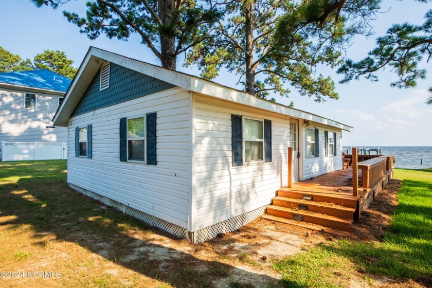 Riverfront cabin with pier and boat lift. Endless views of the - Beach Home for sale in Hertford, North Carolina on Beachhouse.com