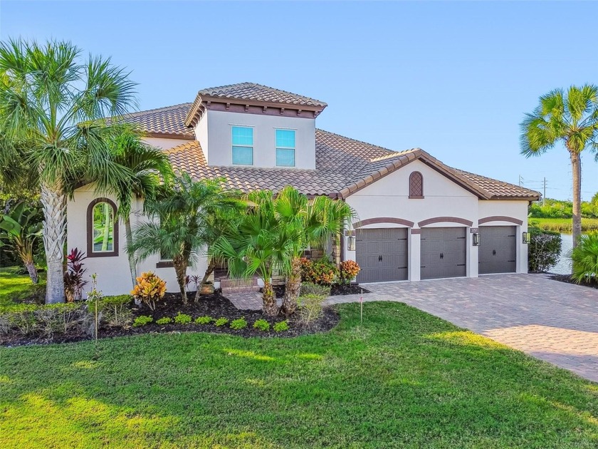 Positioned on one of the most coveted lots within the gated - Beach Home for sale in Oldsmar, Florida on Beachhouse.com