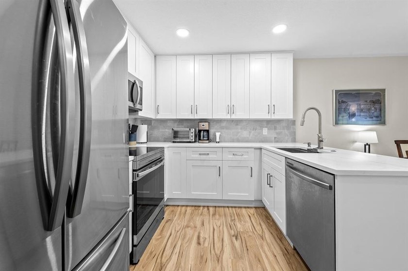 Experience modern, maintenance-free living in this fully - Beach Condo for sale in Greenacres, Florida on Beachhouse.com