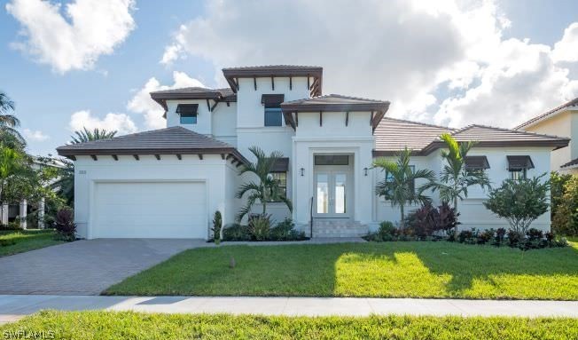 This two-story, great-room floor plan offers big water access - Beach Home for sale in Marco Island, Florida on Beachhouse.com