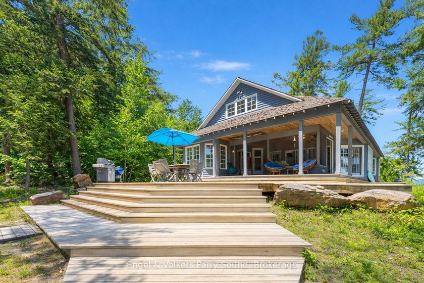 Welcome to an unparalleled Georgian Bay retreat--an exclusive - Beach Home for sale in Carling, Ontario on Beachhouse.com
