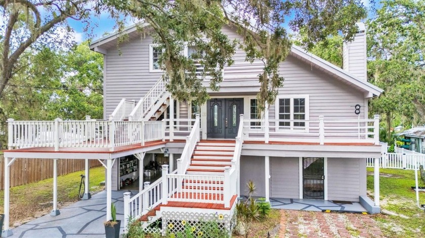Your Coastal Dream Home Awaits! This Waterfront gem sits right - Beach Home for sale in Gibsonton, Florida on Beachhouse.com