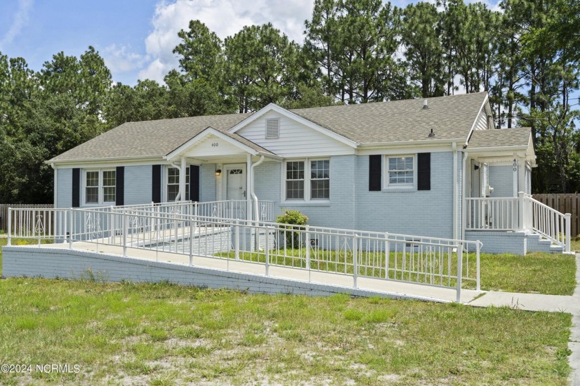 This unique 4 bedroom, 2 bath home offers lots of space and sits - Beach Home for sale in Wilmington, North Carolina on Beachhouse.com