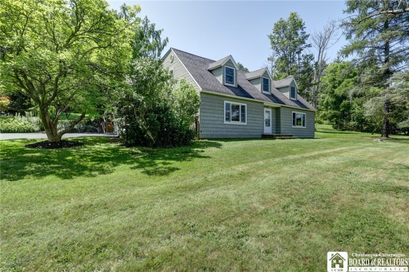 Beautifully updated home with many outdoor spaces to enjoy the - Beach Home for sale in North Harmony, New York on Beachhouse.com