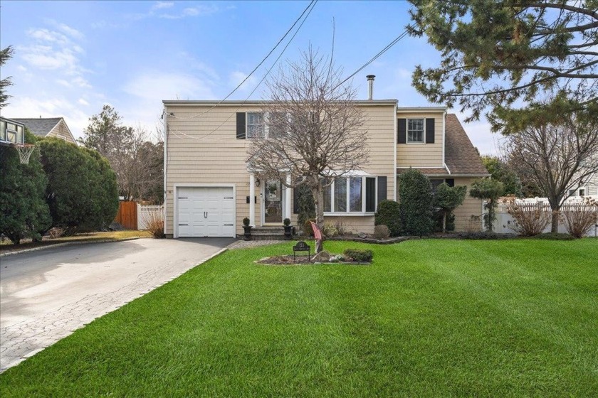 Welcome to this charming South Amityville Colonial! Offering 3 - Beach Home for sale in Amityville, New York on Beachhouse.com