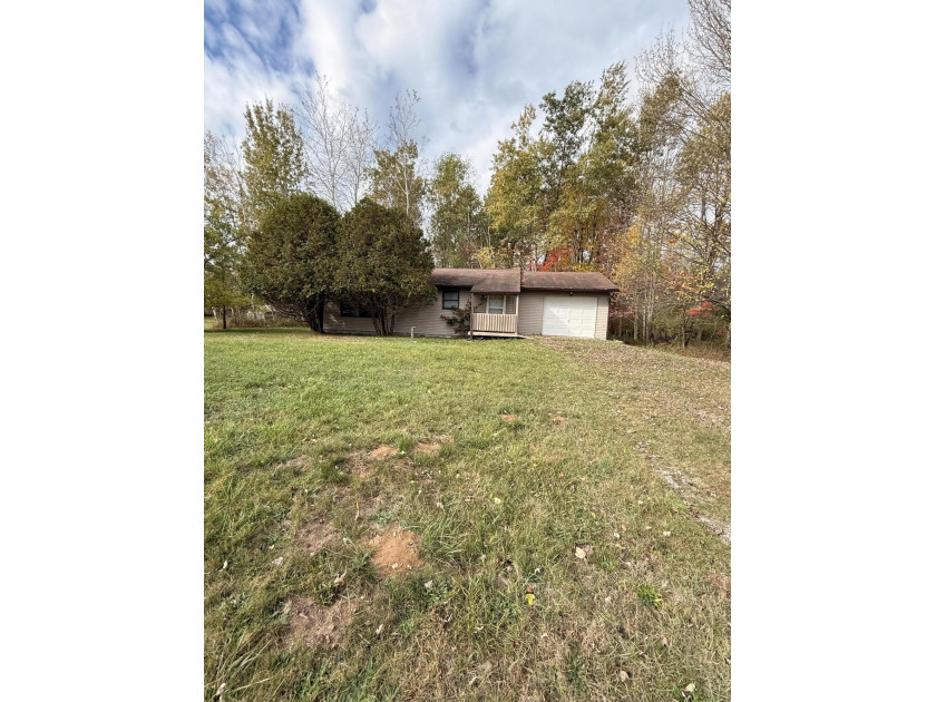 This 2 bedroom one bath with an attached garage.The home is - Beach Home for sale in Ludington, Michigan on Beachhouse.com