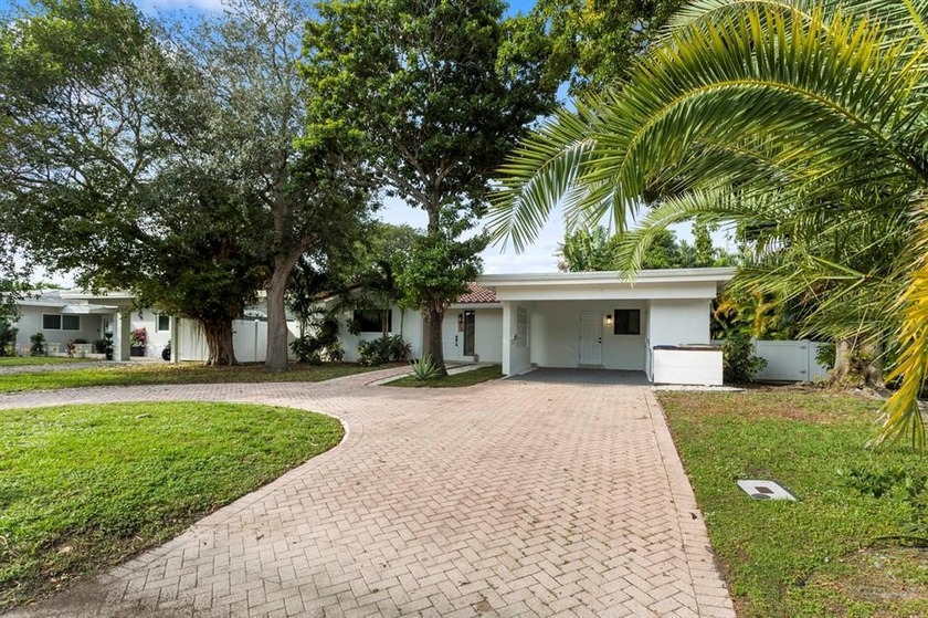 Prime corner lot in sought-after Harbor Village, this - Beach Home for sale in Pompano Beach, Florida on Beachhouse.com