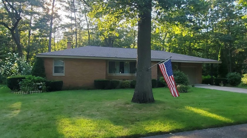 This charming 3 bedroom brick ranch has been lovingly maintained - Beach Home for sale in Muskegon, Michigan on Beachhouse.com