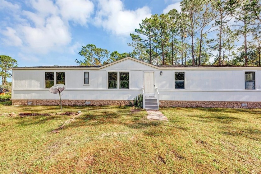 Wow! Fully remodeled 3-bedroom, 3-bath home on 10 acres of - Beach Home for sale in New Smyrna Beach, Florida on Beachhouse.com