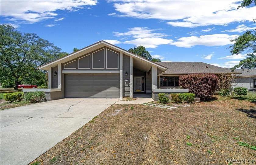 Light-filled, move-in ready home with added living space, a swim - Beach Home for sale in Homosassa, Florida on Beachhouse.com
