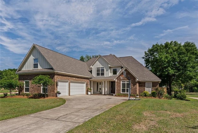 Welcome to this beautifully updated waterfront home offering - Beach Home for sale in Theodore, Alabama on Beachhouse.com