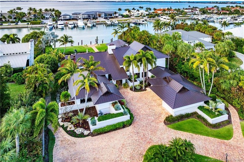 Set along a protected marina, this exceptional waterfront - Beach Home for sale in Stuart, Florida on Beachhouse.com