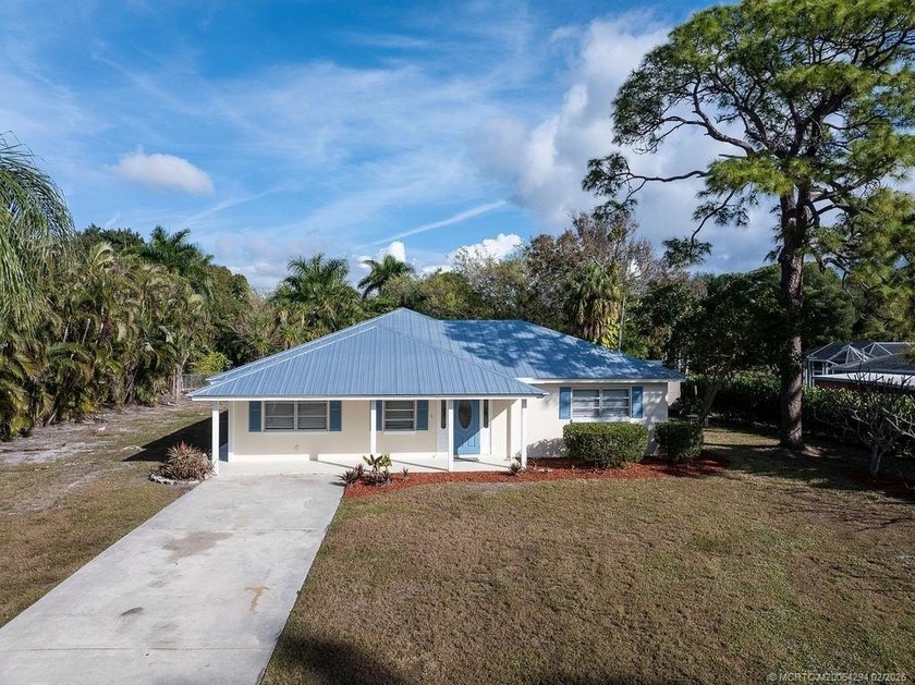 Welcome home to this beautifully renovated 3-bedroom plus - Beach Home for sale in Stuart, Florida on Beachhouse.com