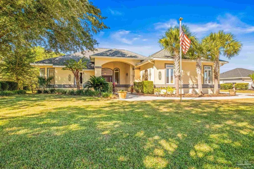 Discover this custom 4-bedroom, 2.5-bath home located on the - Beach Home for sale in Navarre, Florida on Beachhouse.com