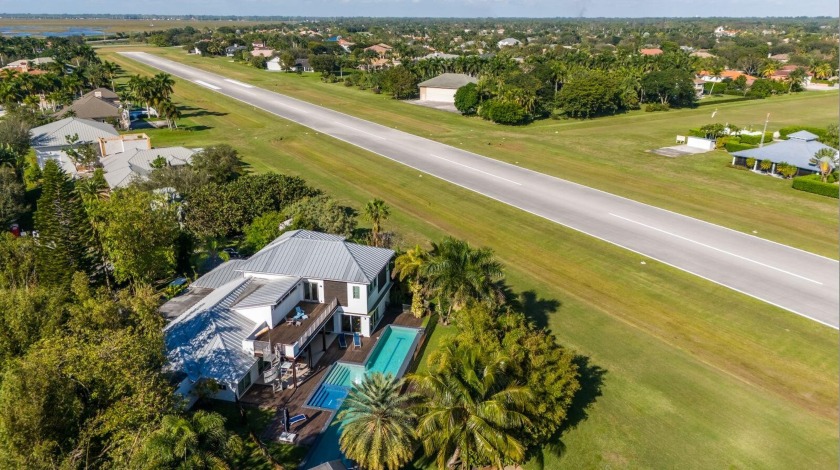 Custom estate home located directly on the runway of South - Beach Home for sale in Wellington, Florida on Beachhouse.com