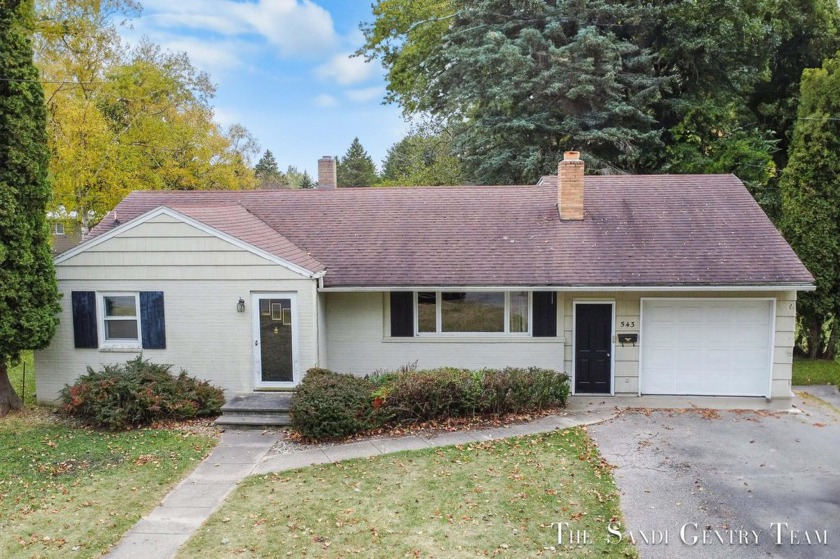 This 3-bedroom, 1.5-bath home offers over 1,800 sq ft of living - Beach Home for sale in Manistee, Michigan on Beachhouse.com