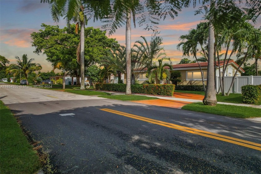 On a Quiet, Tree-Lined Street in Lovely Highland Lakes, a Gated - Beach Home for sale in Miami, Florida on Beachhouse.com