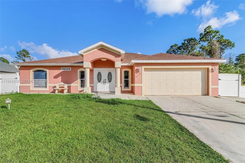Welcome to this spacious 4-bedroom, 2-bath home in Lehigh Acres - Beach Home for sale in Lehigh Acres, Florida on Beachhouse.com