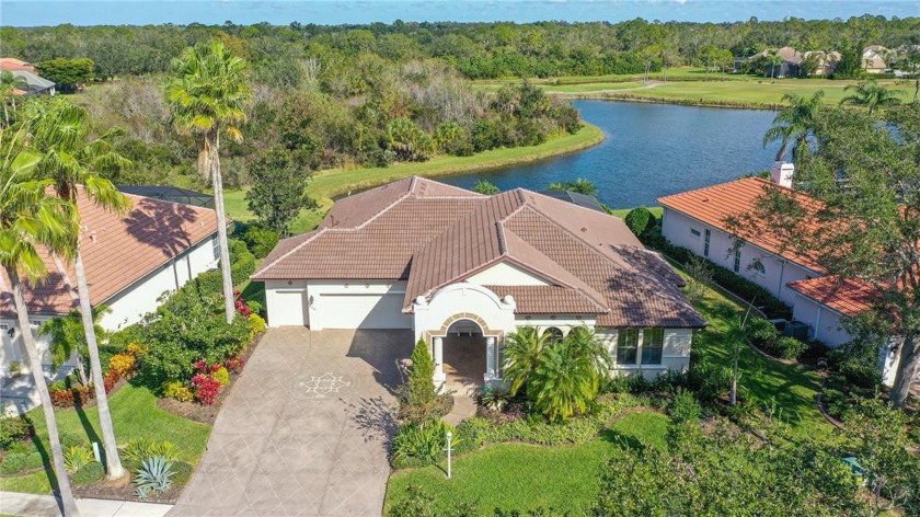 Stunning Waterfront home with breathtaking views of the golf - Beach Home for sale in Lakewood Ranch, Florida on Beachhouse.com