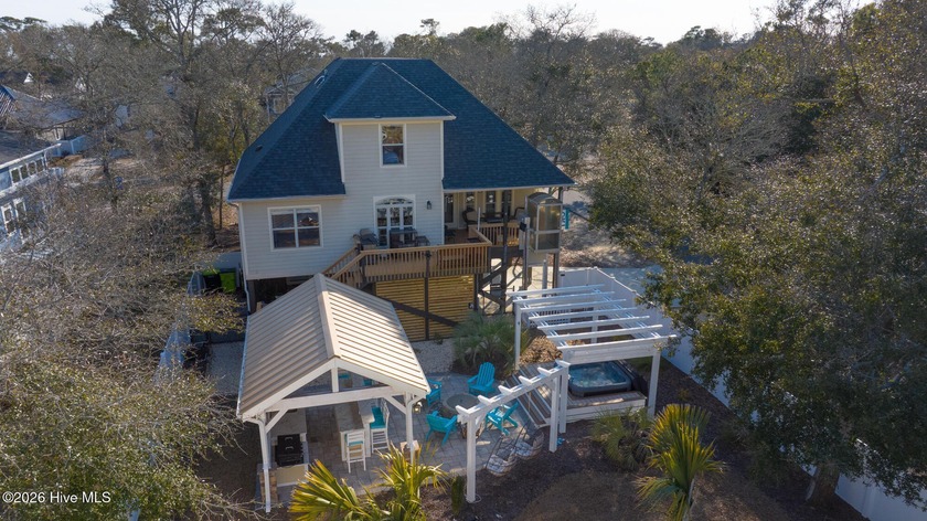 This beach house combines dreamy outdoor entertainment and - Beach Home for sale in Oak Island, North Carolina on Beachhouse.com