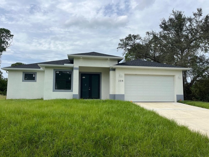 Don't miss this unique opportunity to own a spacious, brand-new - Beach Home for sale in Lehigh Acres, Florida on Beachhouse.com