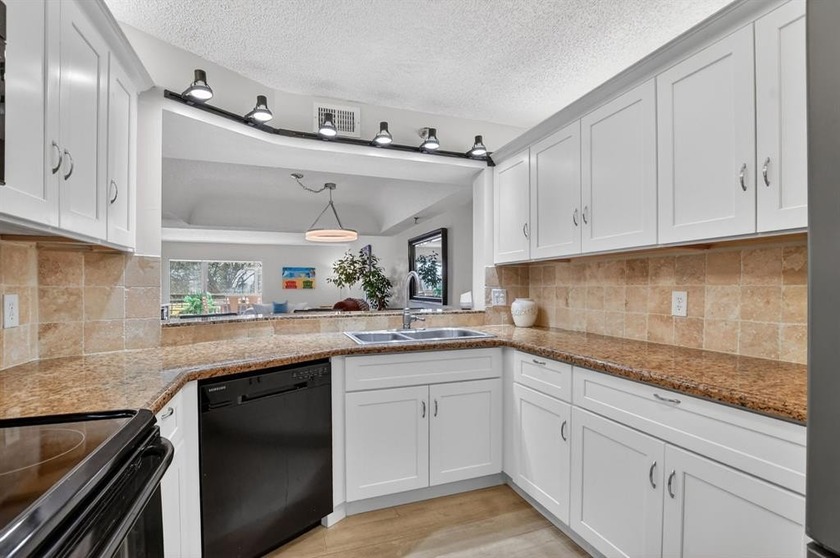 STUNNING FULLY RENOVATED 2 BEDROOM 2 BATH CONDO BOASTING 1800 SQ - Beach Condo for sale in Boca Raton, Florida on Beachhouse.com