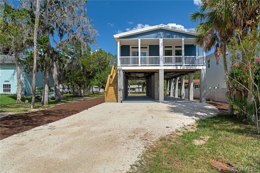 This brand-new stilt home sits on a deep-water canal in the - Beach Home for sale in Homosassa, Florida on Beachhouse.com