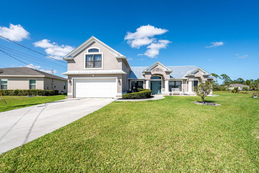 This beautiful custom remodeled home located in the well sought - Beach Home for sale in Port Saint Lucie, Florida on Beachhouse.com