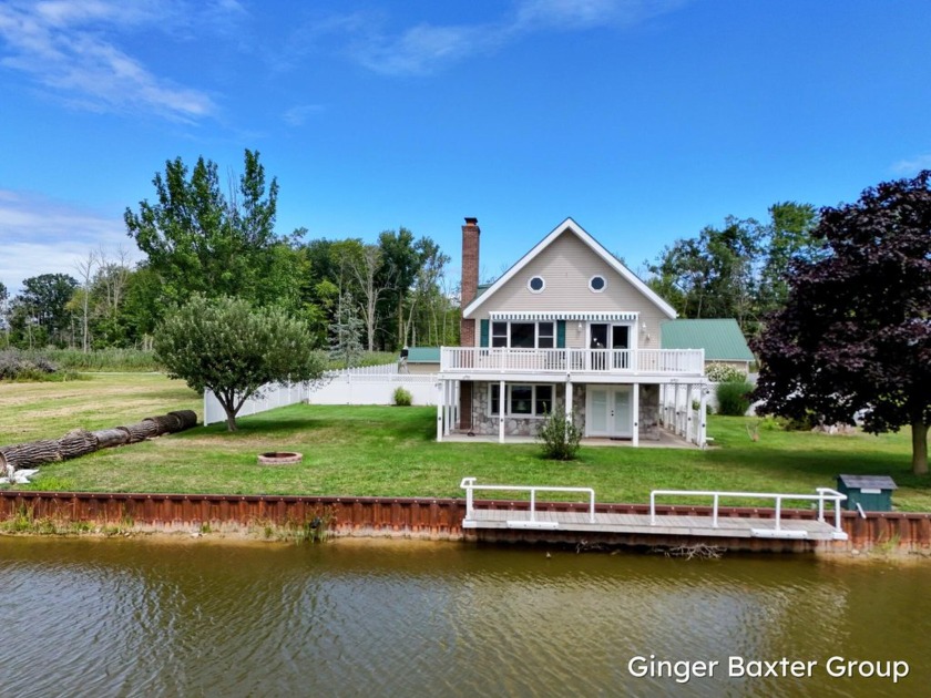 This spacious 3-bedroom home on .62 acres is a year-round - Beach Home for sale in Au Gres, Michigan on Beachhouse.com