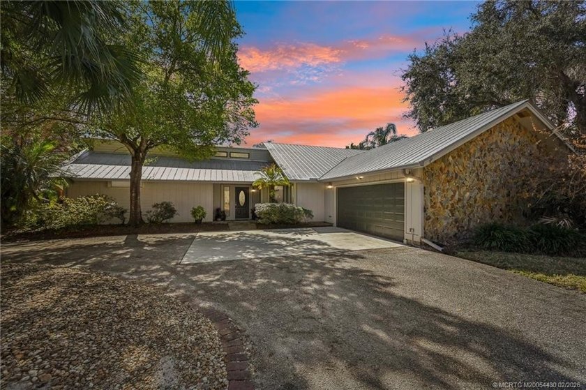 RARE ACRE RETREAT IN MARTIN DOWNS! Experience the perfect blend - Beach Home for sale in Palm City, Florida on Beachhouse.com