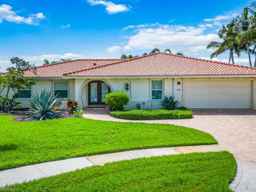 Welcome to this charming ranch-style home perfectly situated in - Beach Home for sale in Marco Island, Florida on Beachhouse.com