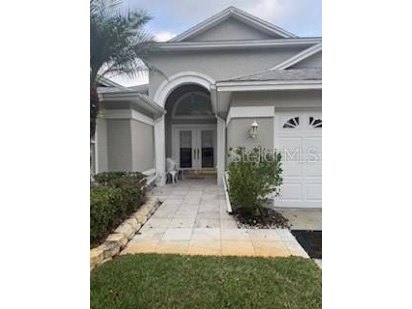 In the beautiful community of Hunters Green, where massive trees - Beach Home for sale in Tampa, Florida on Beachhouse.com