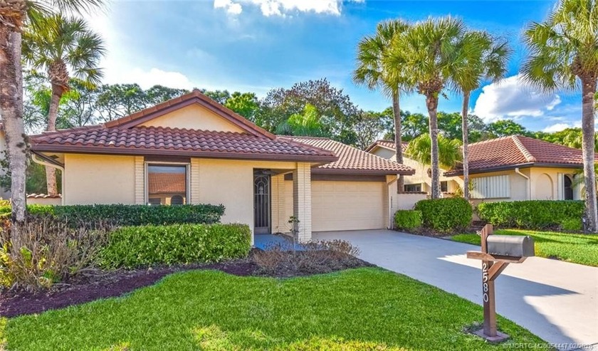 Lovely CBS 3 bedroom, 2 bath, 2 car garage split plan home with - Beach Home for sale in Palm City, Florida on Beachhouse.com